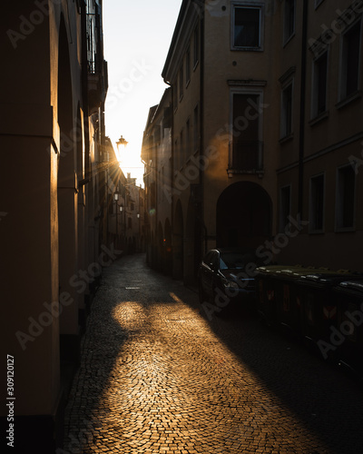 Cobble stone italian street at sunset