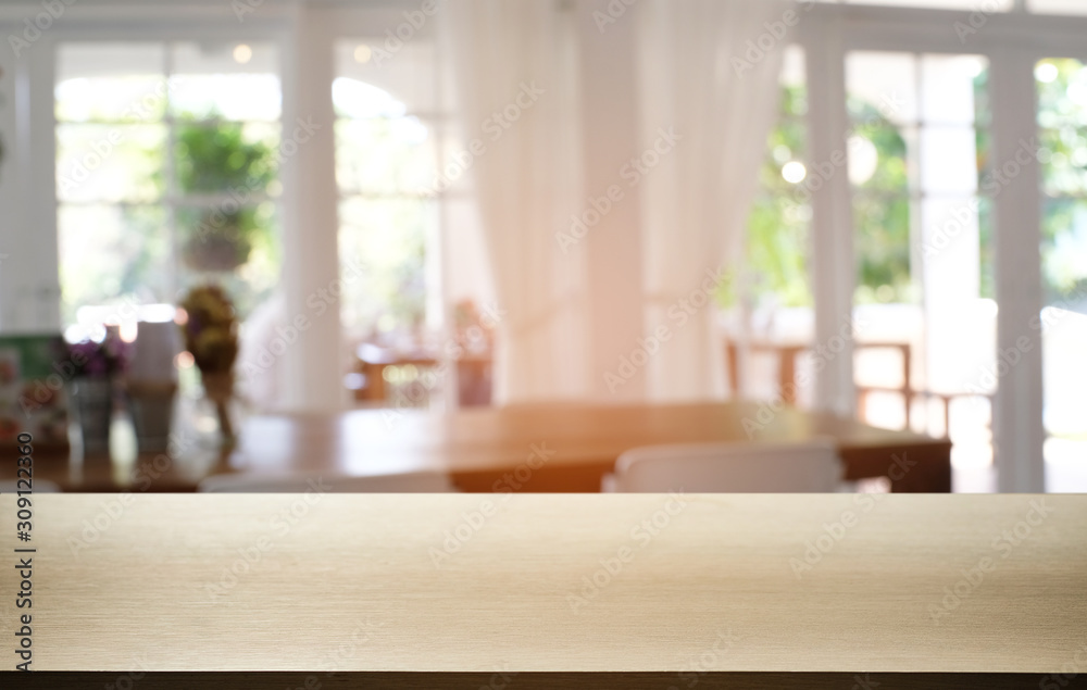 Empty dark wooden table in front of abstract blurred bokeh background of restaurant . can be used for display or montage your products.Mock up for space. Empty dark wooden table in front of abstract blurred bokeh background of restaurant . can be used for display or montage your products.Mock up for space.