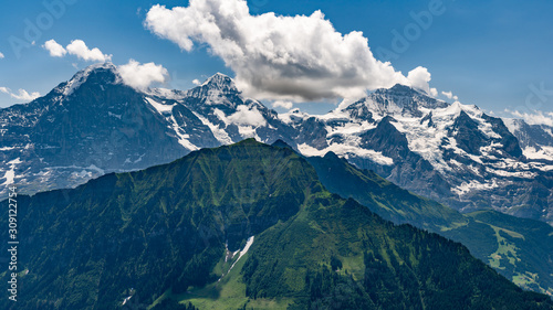 Switzerland, Panoramic view on green Alps and Mannlichen mpuntain from Schynige Platte