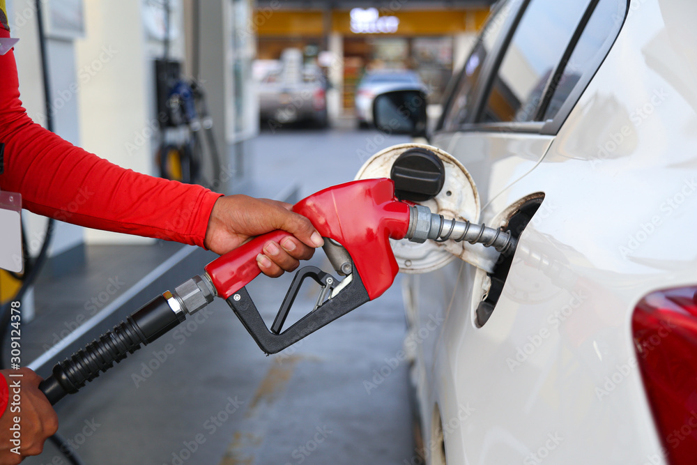Car refueling on the petrol station. Car refueling on the petrol station.