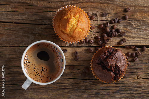 Coffee cup and two muffins