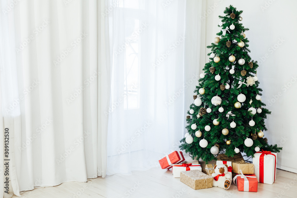Christmas tree with gifts holiday new year interior decor as background