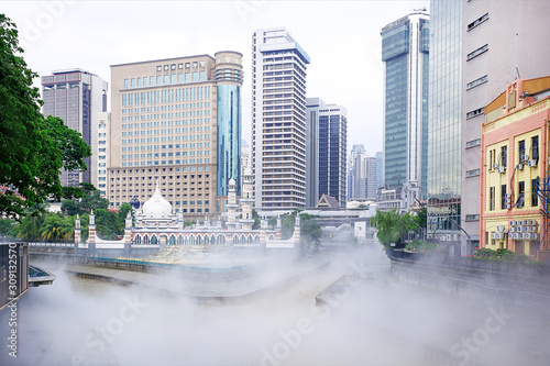 Photography Urban scenery with skyline, river and mosque of kuala lumpur, Malaysia