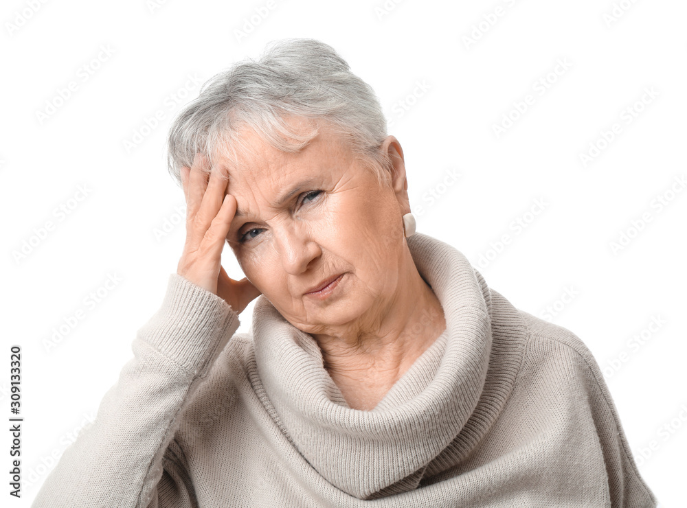 Senior woman suffering from headache on white background Senior woman suffering from headache on white background
