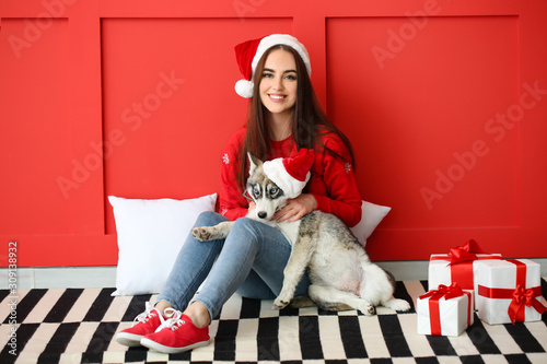 Cute woman with funny husky...