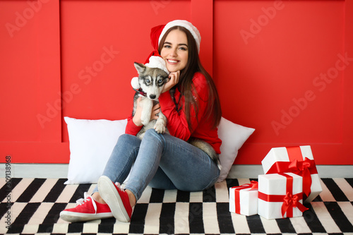 Cute woman with funny husky...