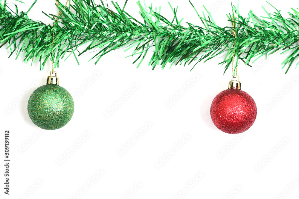close up of christmas ball and pine tree on white close up of christmas ball and pine tree on white