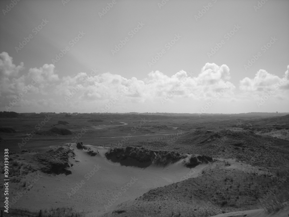 View on exterior this a dune beach shooted in black and white with a cloud cordon