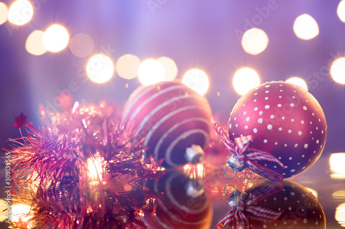 Christmas balls on bokeh holiday background