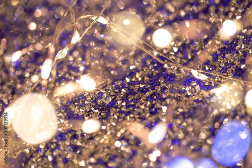 Beutiful festive background, shallow depth of field. Color of the year 2020 concept, classic blue colored trend for your design. Copy space. COY2020. Amazing shining glitter sparkles for cards, design