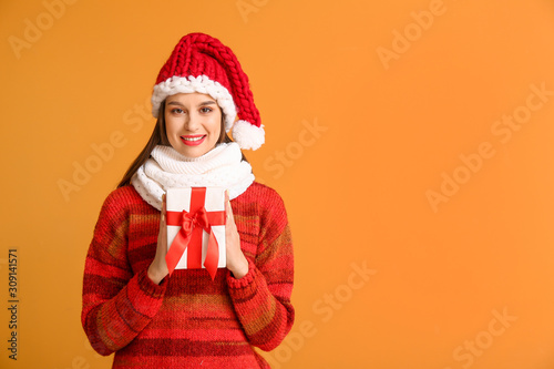 Happy young woman in winter...