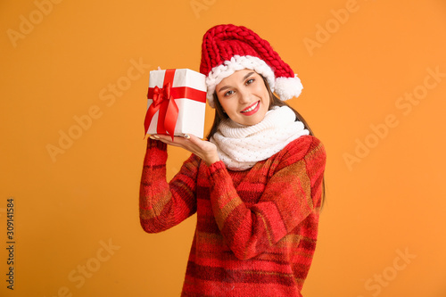 Happy young woman in winter...