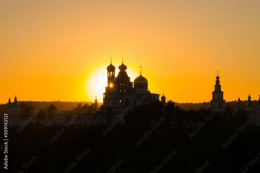 Resurrection New Jerusalem Monastery on a sunset background in the Moscow region, Russia