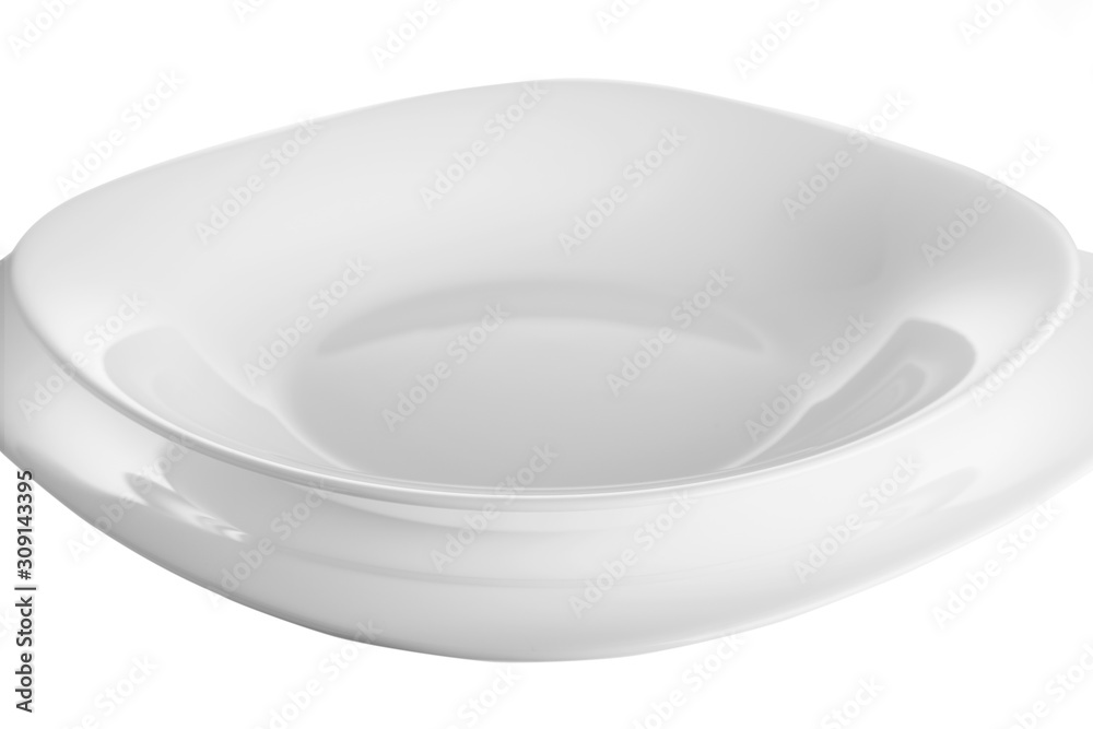 Two white ceramic empty plates isolated on white background Two white ceramic empty plates isolated on white background