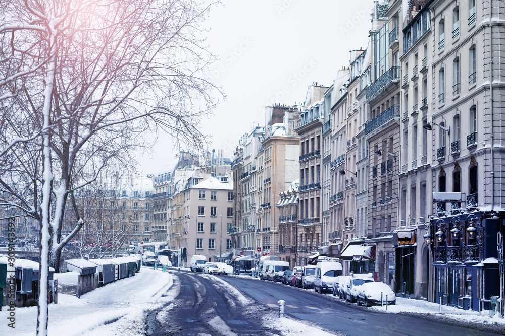 Street covered with snow, canal saint Martin Paris