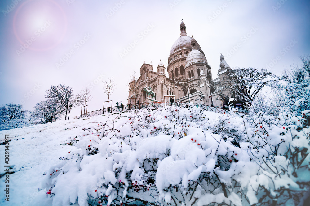 Winter snow day view Sacre-Coeur Montmartre Paris