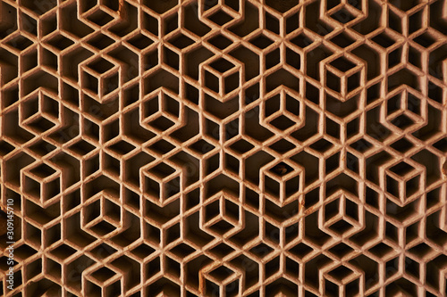 Photography Indian or arabic window pattern. Window with many holes
