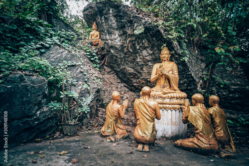 Buddha at Mount Phou Si, also written Mount Phu Si, is a 100 m high hill in centre of the old town of Luang Prabang in Laos photo