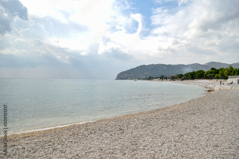 Obraz premium Mattinata Beach by Morning with Cloudy Sky