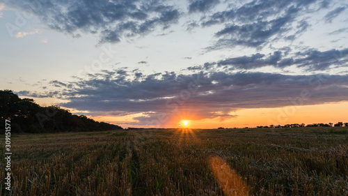 Beautiful Sunrise over the field.Summer evening in Blagoveshenskaya. Anapa, Russia.