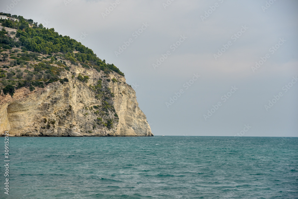 Mattinata Coast by Morning with Cloudy Sky and Gargano Promontory View Mattinata Coast by Morning with Cloudy Sky and Gargano Promontory View