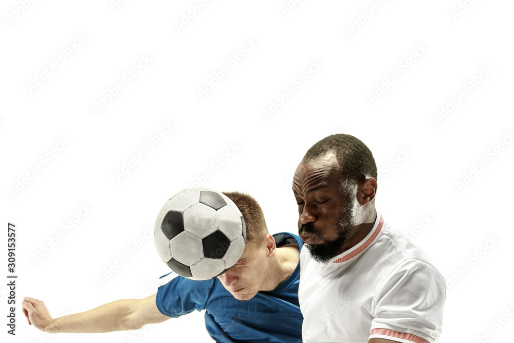 Close up of emotional men playing soccer hitting the ball with the head on isolated on white background. Football, sport, facial expression, human emotions concept. Copyspace. Fight for goal. Close up of emotional men playing soccer hitting the ball with the head on isolated on white background. Football, sport, facial expression, human emotions concept. Copyspace. Fight for goal.