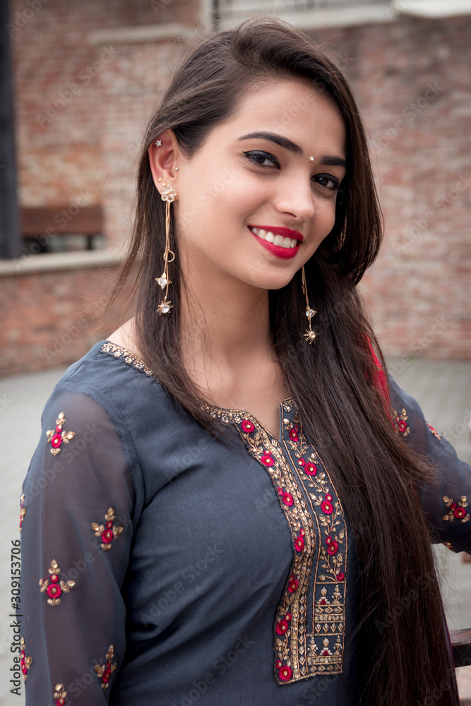 Portrait of indian girl in traditional dress. Traditional accessories of  Indian girls. Stock Photo