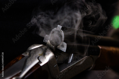 Smoking hunting gun or shotgun, clay pigeon shooting, Aviemore, Scotland, UK