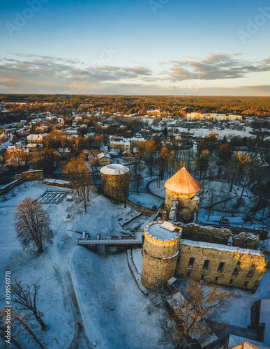 Photography Aerial view of beautiful ruins of ancient Livonian castle in old town of Cesis,