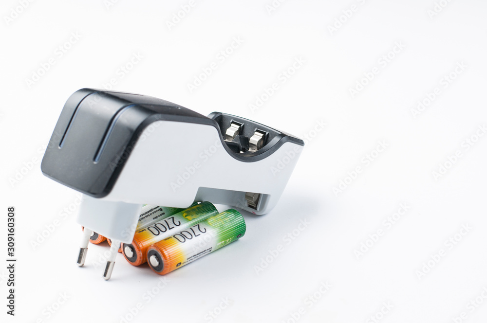 Naklejka premium Battery charger isolated on white background.Copy space