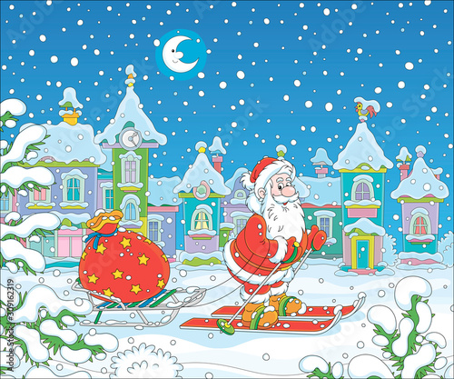 Santa Claus skiing and carrying his bag of Christmas gifts on his sledge through a snow-covered winter town on the snowy night before Christmas, vector cartoon illustration