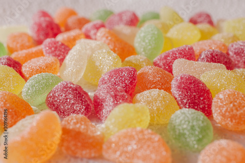 Colorful fruity jelly candies as background. 