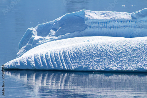 An iceberg among the islands around the Antarctic Peninsula, Palmer Archipelago, Antarctica. © Marco Ramerini