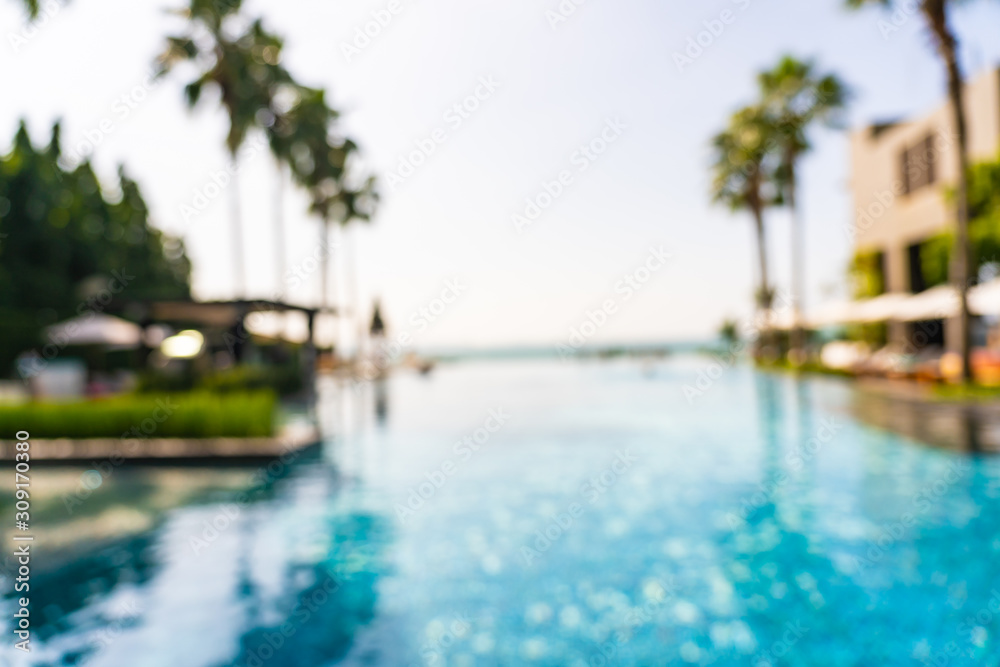 Abstract blur outdoor swimming pool in hotel resort