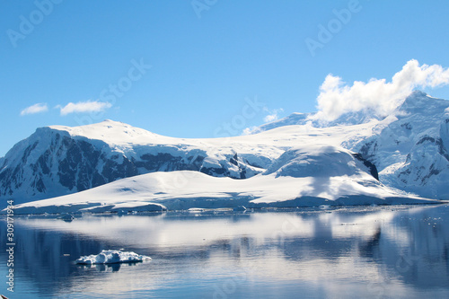 Snow-capped mountains on an island along the coasts of the Antarctic Peninsula  Palmer Archipelago  Antarctica