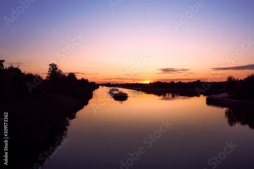 Sunset over a waterway in northern Germany © Mike