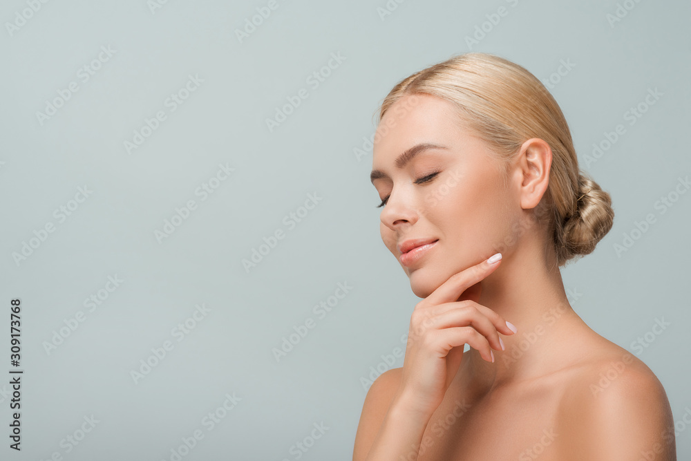 happy naked girl touching face isolated on grey happy naked girl touching face isolated on grey