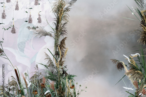 Scenery for a romantic photo shoot of grass and reeds. Background for postcard.