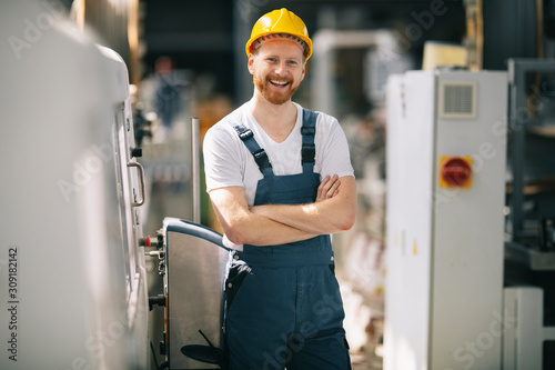 Portrait of worker in factory. photo