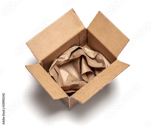 Open cardboard box with wrapping paper inside. Isolated on a white background. Top view. mock-up.