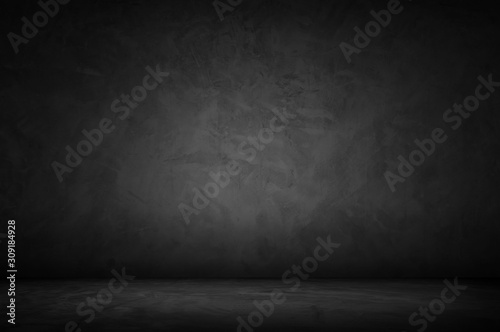 Black wall room background The surface of the brick dark jagged. Abstract black wall empty room background for interior design and decoration.