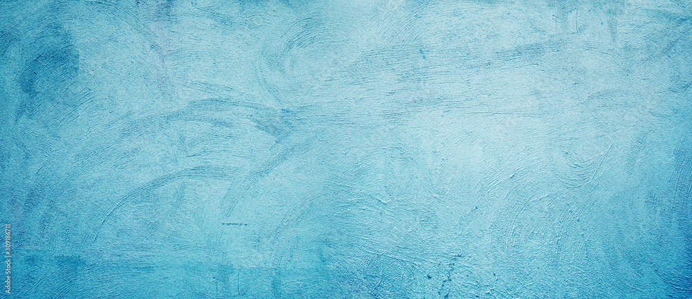 Obraz premium The background of the stucco wall is blue. Abstract grunge decorative plaster wall. Rough surface with light blue cyan pattern, copy area for design