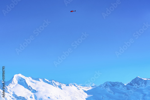Helicopter flying over Hintertux Glacier in Austria