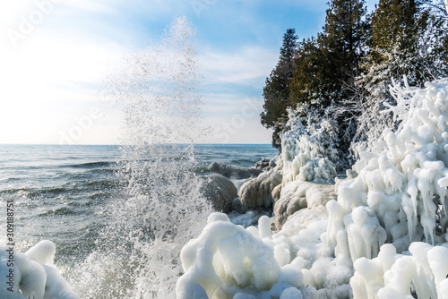 icy shoreline at cave point park door county wisconsin photo