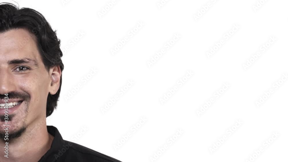 Slow-motion half-face attractive bearded hipsanic man with upbeat, positive expression, look camera sincere and enthusiastic, start to smile from happiness, heartwarming feelings, white background Slow-motion half-face attractive bearded hipsanic man with upbeat, positive expression, look camera sincere and enthusiastic, start to smile from happiness, heartwarming feelings, white background