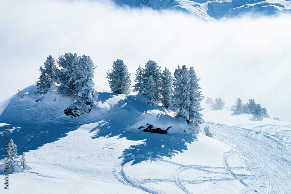 Fototapeta premium Landscape in Zillertal Arena ski resort in clouds in Austria