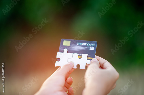 Hand and credit cards, online business operations, and cashless purchases Credit card ideas for shopping