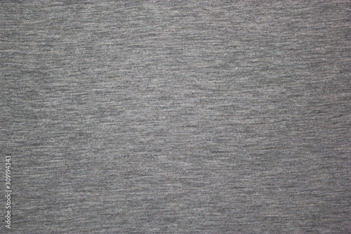 Flecked gray fabric texture close up view