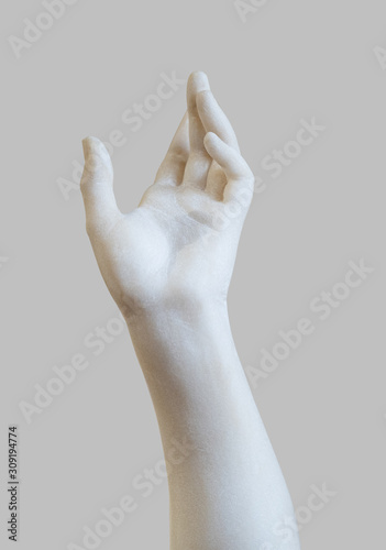 marble statue white hand reaching out photo