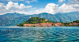 Popular tourist destination - Bellagio town, view from ferry boat. Superb morning scene of Como lake, Italy, Europe. Traveling concept background.